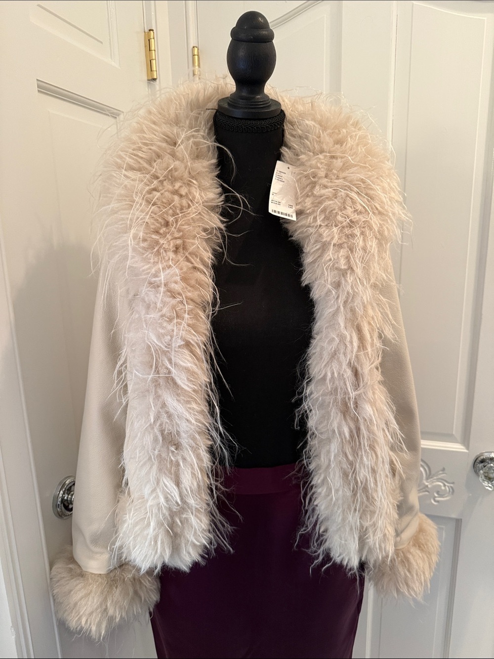 Urban Outfitters Kimchi Blue faux fur and leather jacket in light cream-